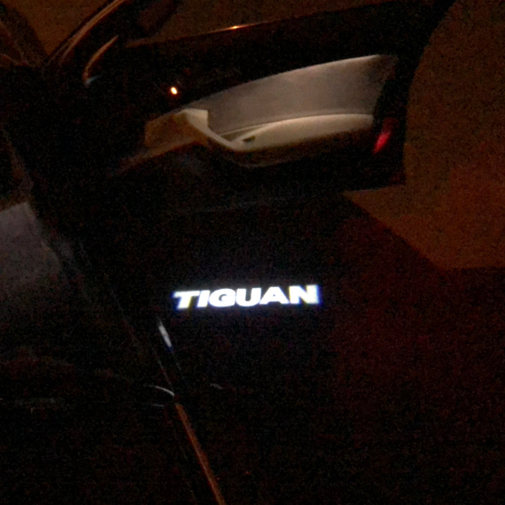 Volkswagen Türleuchten TIGUIAN Logo Nr. 24 (Stück 1 = 2 LOGO FILM / 2 Türleuchten)