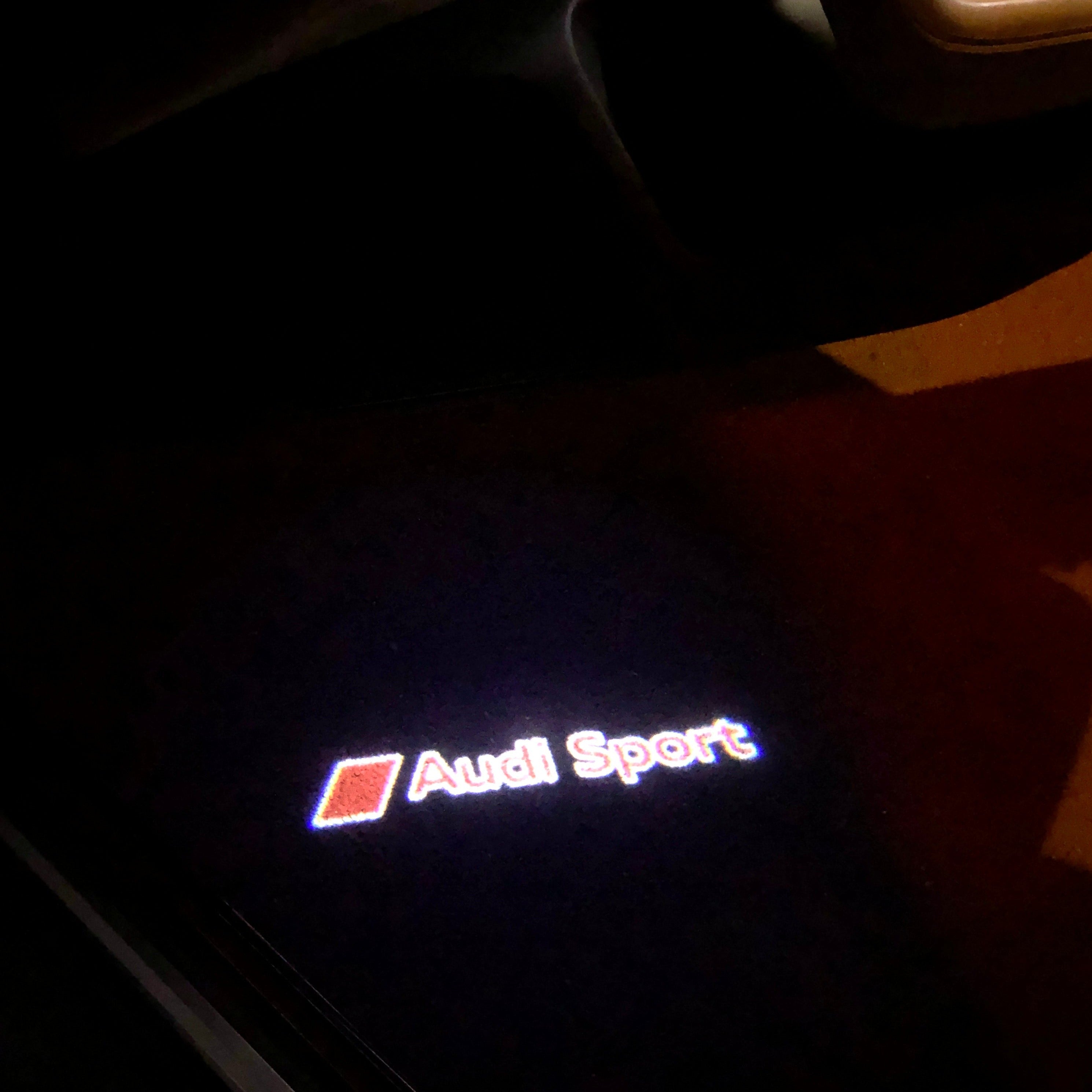 AUDI LOGO PROJECTOT LIGHTS Nr.31 (Menge 1 = 2 Logofolien /2 Türleuchten)