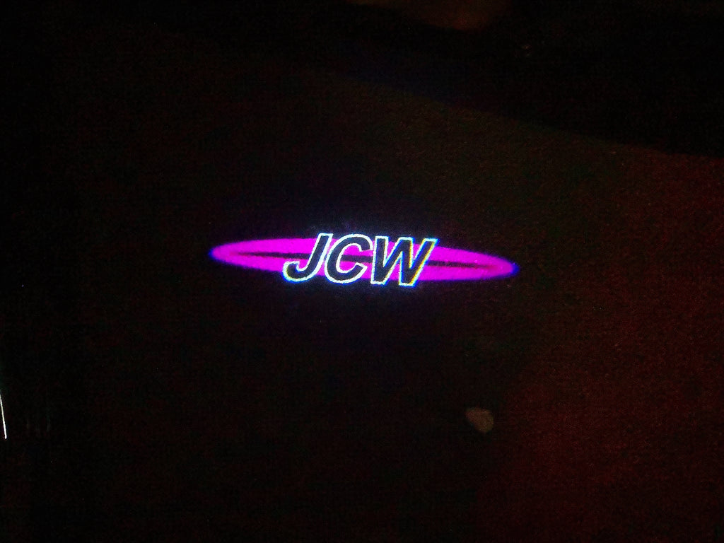 JOHN COOPER ARBEITET LOGO PROJECROTR LIGHTS Nr.118 (Menge 1 = 2 Logo Film / 2 Türlichter)